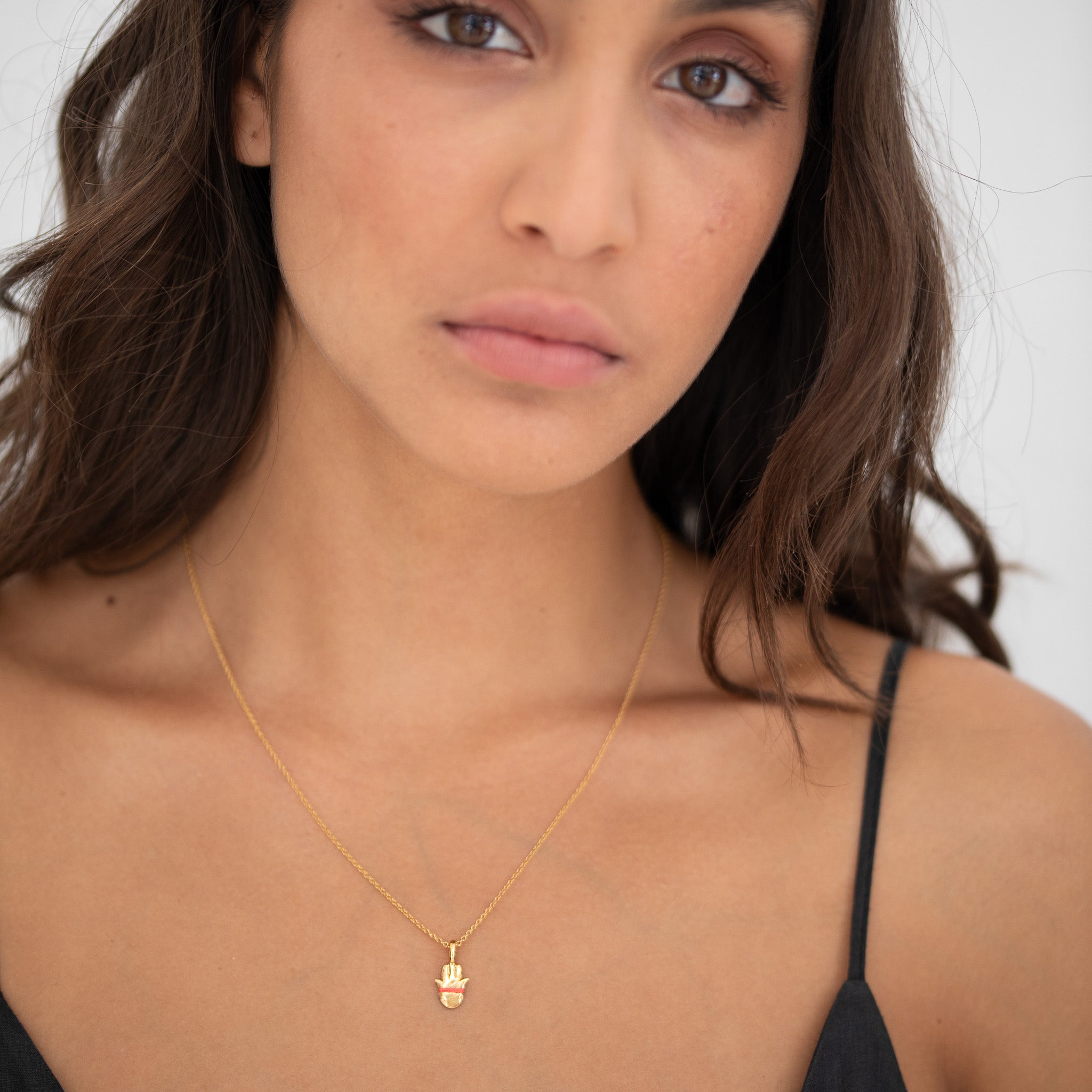 The Tiny Talisman Hamsa Necklace