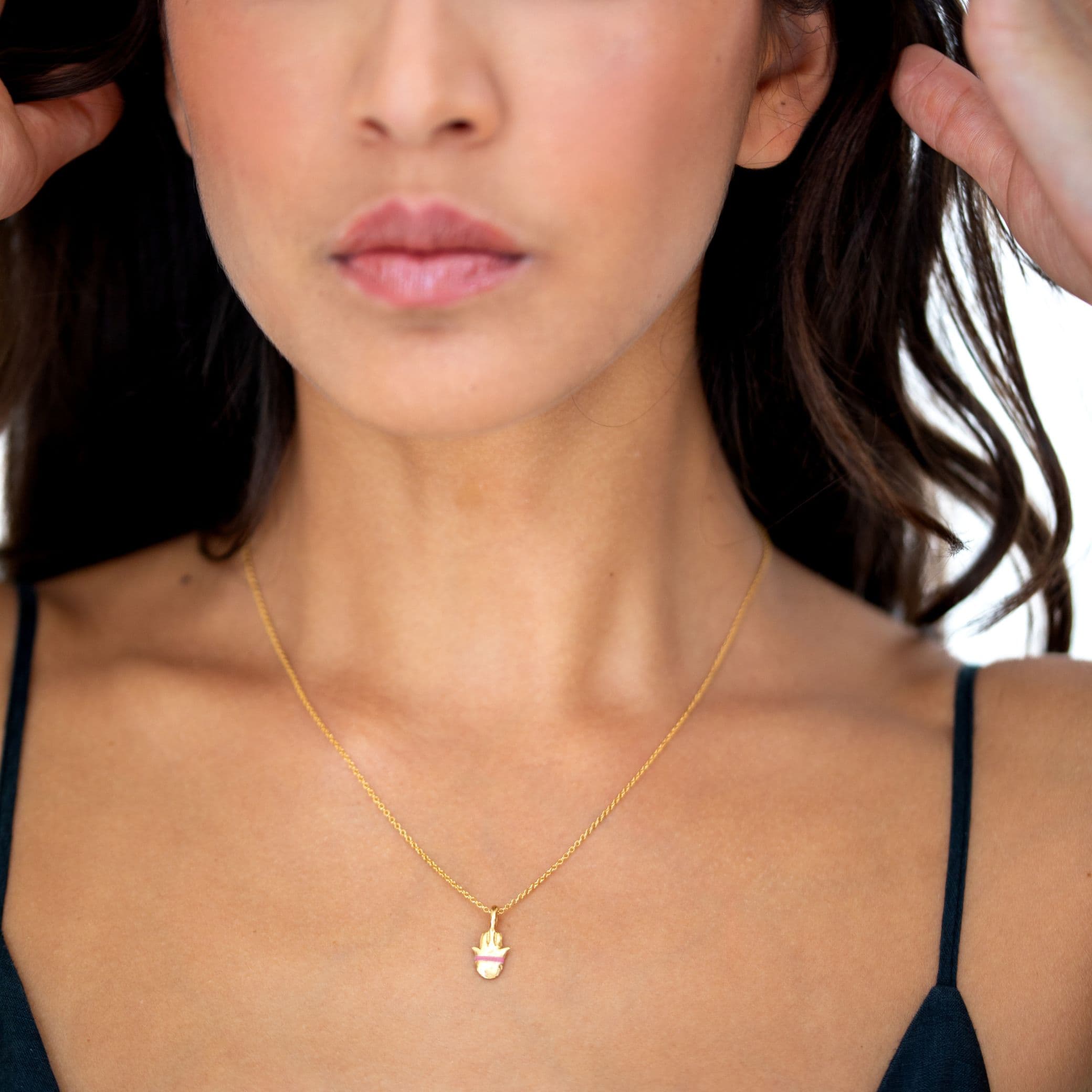 The Tiny Talisman Hamsa Necklace