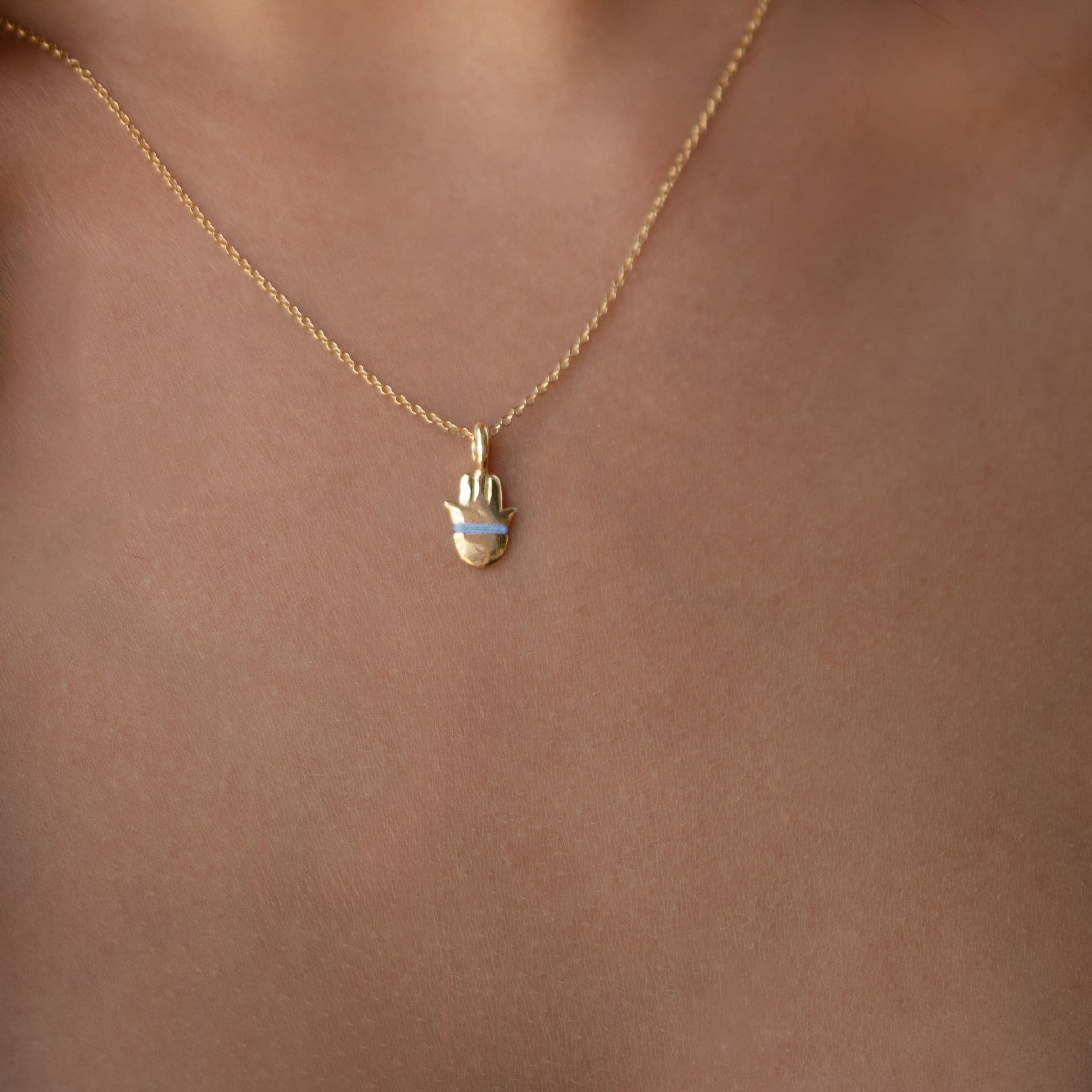 The Tiny Talisman Hamsa Necklace