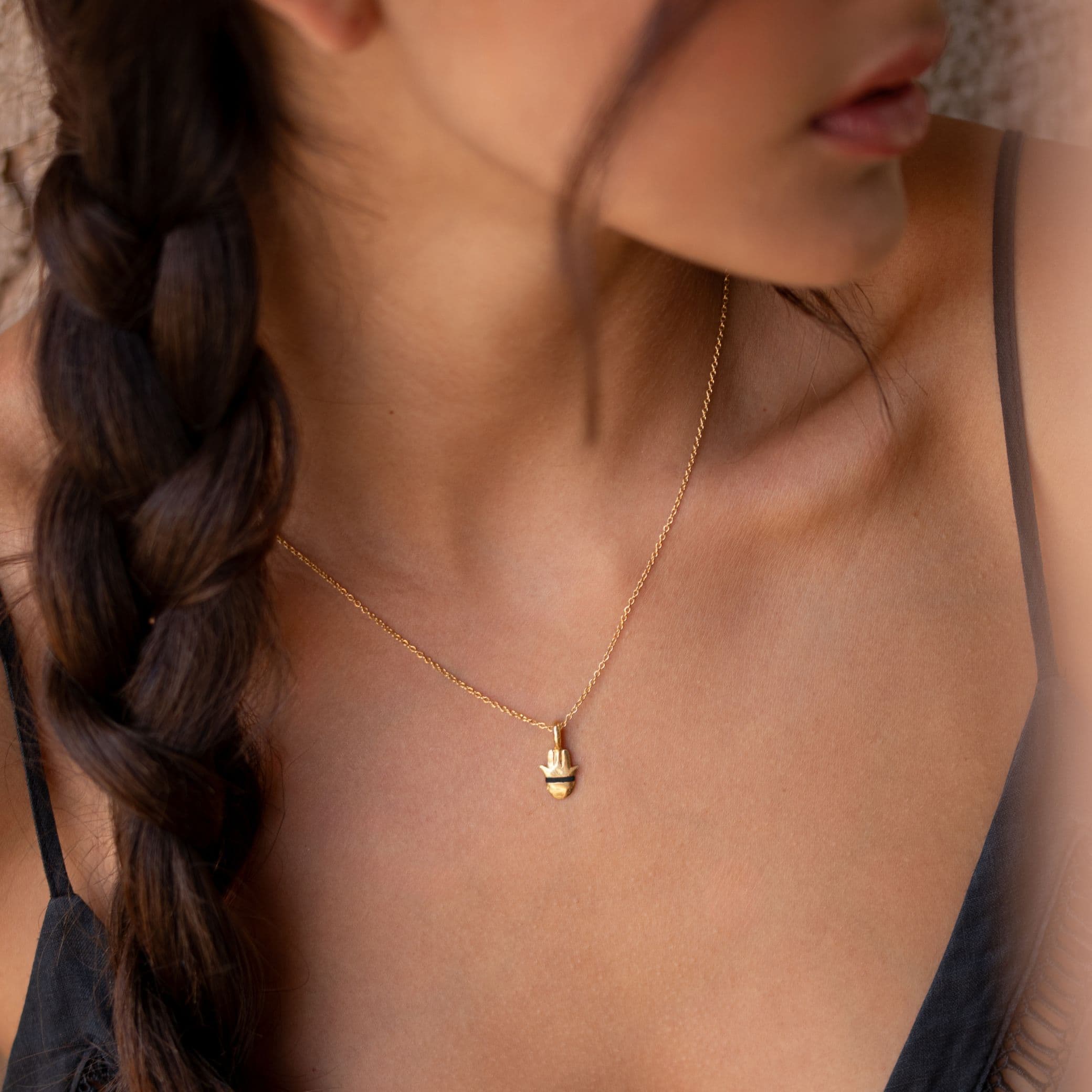 The Tiny Talisman Hamsa Necklace