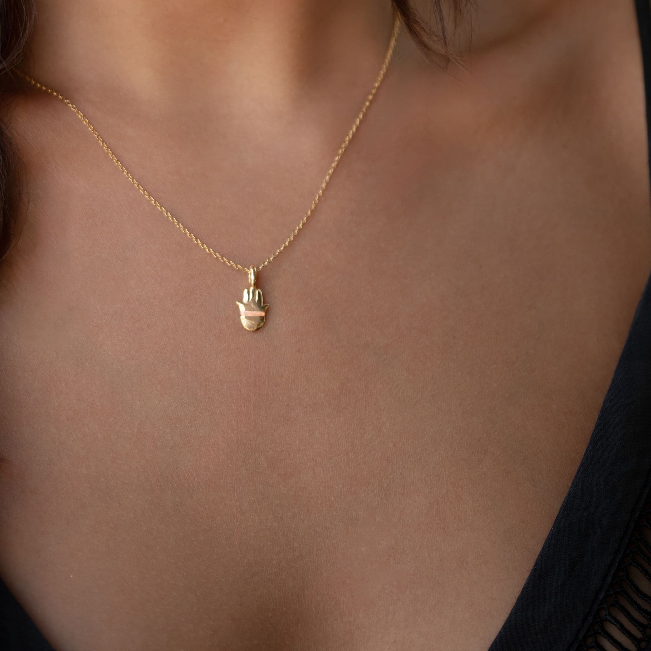 The Tiny Talisman Hamsa Necklace